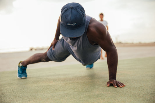 Focused man demonstrating impressive strength with one-armed pushups