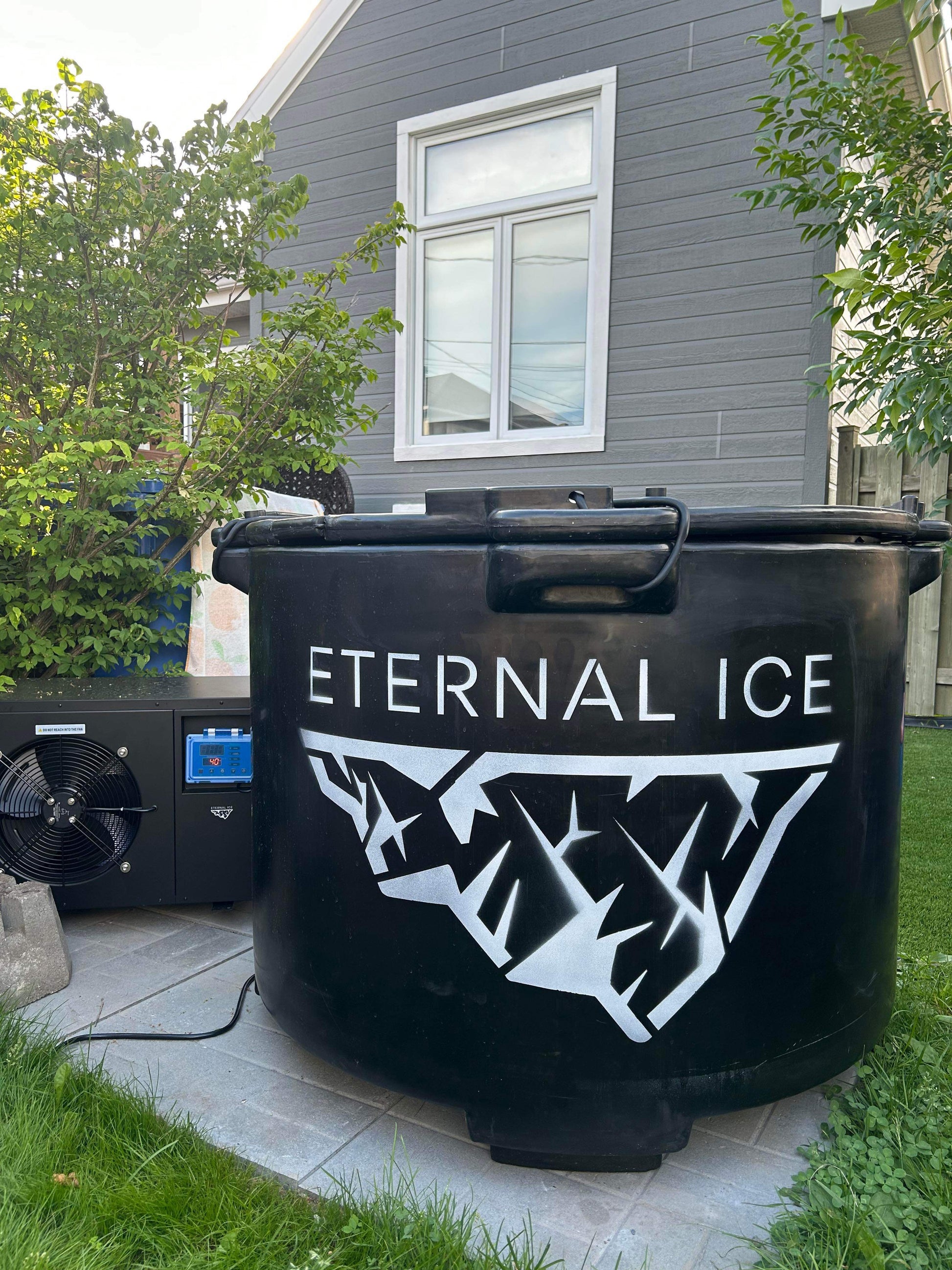 An image showcasing the Eternal Ice HD Pro Ice Bath and its companion, the Eternal Ice Power Chiller, designed for professional-grade chilling experiences. The ice bath gleams with a polished finish, while the chiller hums with power, promising an enduring supply of icy refreshment.